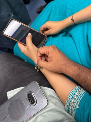 Hands and phone